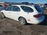 ✅ 1999 Ford Taurus SE • VIN: 1FAFP58SXXG191894 • Lot: 41628348. Listed on IAAI with 168,299 mi. Free auction sales archive from the USA and detailed vehicle history report at DreamBid. Image 3.