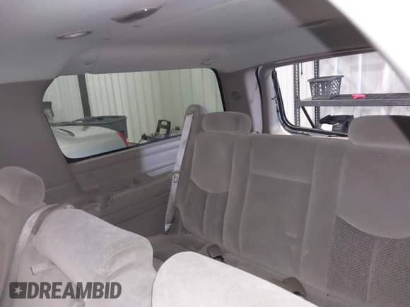 2005 Chevrolet Suburban LS z VIN 1GNFK16Z45J176719, wystawiony jako IAAI lot #42325067 z przebiegiem 199 884 mil mil oraz . Historia ofert i sprzedaży dostępna na DreamBid. Obrazek 18.