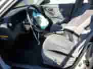 2005 Hyundai Elantra GLS z VIN KMHDN46D15U065617, wystawiony jako Copart lot #80891964 z przebiegiem 187 401 mil mil oraz Szkoda całkowita • Salvage title. Historia ofert i sprzedaży dostępna na DreamBid. Obrazek 7.