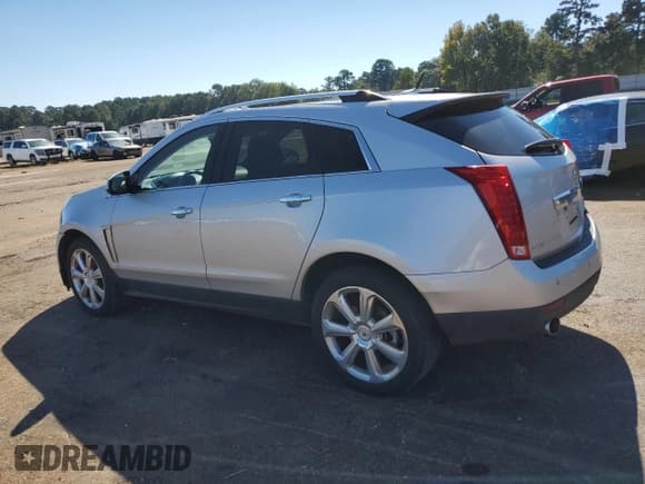 ✅ 2013 Cadillac SRX Premium Collection • VIN: 3GYFNEE31DS524701 • Lot: 84372895. Wystawiony na Copart z przebiegiem 207 688 mil. Bezpłatny archiwum sprzedaży aukcyjnych z USA i szczegółowy raport historii pojazdu na DreamBid. Zdjęcie 2.