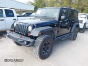 ✅ 2017 Jeep Wrangler Unlimited Sport • VIN: 1C4BJWDG1HL597685 • Lot: 43820293. Listed on IAAI with 65,323 mi. Free auction sales archive from the USA and detailed vehicle history report at DreamBid. Image 2.