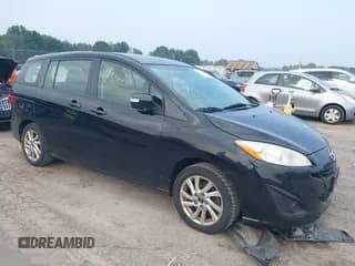 ✅ 2013 Mazda 5 Sport • VIN: JM1CW2BL5D0148214 • Lot: 42936674. Listed on IAAI with 206,957 mi. Free auction sales archive from the USA and detailed vehicle history report at DreamBid. Image 1.