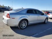 ✅ 2011 Chevrolet Malibu LTZ • VIN: 1G1ZE5EU1BF280084 • Lot: 79184594. Listed on Copart with 133,297 mi. Free auction sales archive from the USA and detailed vehicle history report at DreamBid. Image 3.