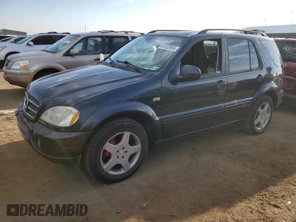 ✅ 2001 Mercedes-Benz M AMG • VIN: 4JGAB74E01A242078 • Лот: 64102894. Опубликован ранее на Copart с пробегом 144 519 миль. Бесплатный доступ к архиву аукционных продаж из США и подробный отчёт об истории автомобиля на DreamBid. Изображение 1.