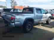 2022 Toyota Tacoma SR5 with VIN 3TMAZ5CN9NM186656, listed as a IAAI auction lot 43253480 with 25,540 mi miles and . Bid and sale history available at DreamBid. Image 4.