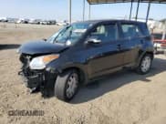 ✅ 2009 Scion xD • VIN: JTKKU10499J048909 • Lot: 91502885. Listed on Copart with 128,936 mi. Free auction sales archive from the USA and detailed vehicle history report at DreamBid. Image 1.