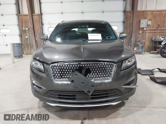 ✅ 2019 Lincoln MKC Reserve • VIN: 5LMCJ3D96KUL49964 • Lot: 43191254. Wystawiony na IAAI z przebiegiem 77 324 mil. Bezpłatny archiwum sprzedaży aukcyjnych z USA i szczegółowy raport historii pojazdu na DreamBid. Zdjęcie 12.
