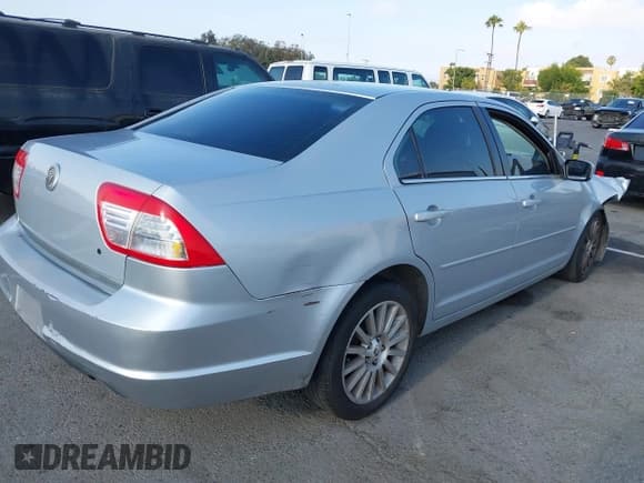 ✅ 2006 Mercury Milan Premier • VIN: 3MEFM08146R612012 • Lot: 42757640. Wystawiony na IAAI z przebiegiem 142 444 mil. Bezpłatny archiwum sprzedaży aukcyjnych z USA i szczegółowy raport historii pojazdu na DreamBid. Zdjęcie 4.