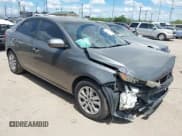 ✅ 2012 Kia Forte EX • VIN: KNAFU4A29C5470537 • Lot: 42569961. Listed on IAAI with 179,664 mi. Free auction sales archive from the USA and detailed vehicle history report at DreamBid. Image 1.