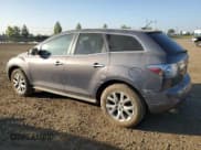 ✅ 2009 Mazda CX-7 Sport • VIN: JM3ER293290218238 • Лот: 81576475. Опубликован ранее на Copart с пробегом 205 687 миль. Бесплатный доступ к архиву аукционных продаж из США и подробный отчёт об истории автомобиля на DreamBid. Изображение 2.