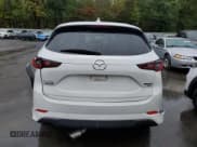 ✅ 2023 Mazda CX-5 Signature • VIN: JM3KFBXY3P0133741 • Lot: 85779055. Listed on Copart with 22,689 mi. Free auction sales archive from the USA and detailed vehicle history report at DreamBid. Image 6.