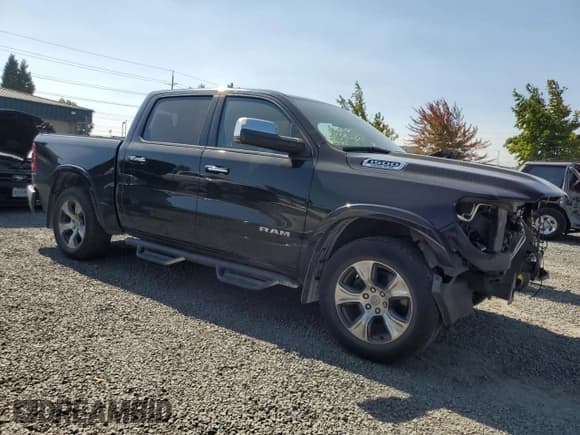 ✅ 2019 Ram 1500 Laramie • VIN: 1C6SRFJTXKN505678 • Lot: 71889525. Listed on Copart with 69,487 mi. Free auction sales archive from the USA and detailed vehicle history report at DreamBid. Image 4.