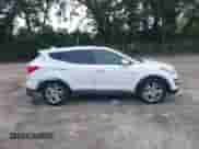 2013 Hyundai Santa Fe Sport z VIN 5XYZW3LA1DG043094, wystawiony jako IAAI lot #43038727 z przebiegiem 160 798 mil mil oraz . Historia ofert i sprzedaży dostępna na DreamBid. Obrazek 13.