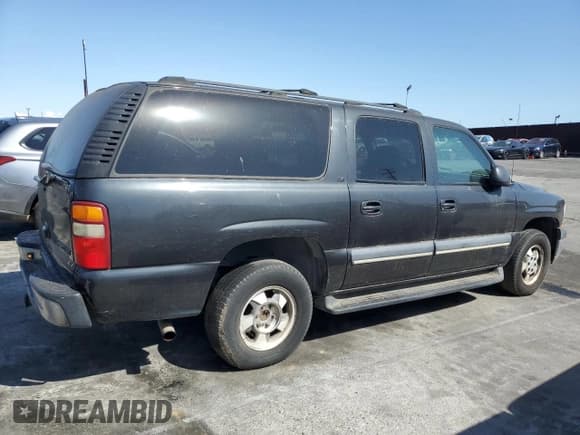 ✅ 2003 Chevrolet Suburban LS • VIN: 3GNEC16T43G343955 • Лот: 51368415. Опубликован ранее на Copart с пробегом 217 420 миль. Бесплатный доступ к архиву аукционных продаж из США и подробный отчёт об истории автомобиля на DreamBid. Изображение 3.