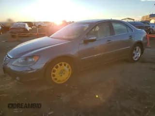 ✅ 2007 Acura RL • VIN: JH4KB16587C000637 • Лот: 82322114. Опубликован ранее на Copart с пробегом 125 042 миль. Бесплатный доступ к архиву аукционных продаж из США и подробный отчёт об истории автомобиля на DreamBid. Изображение 1.