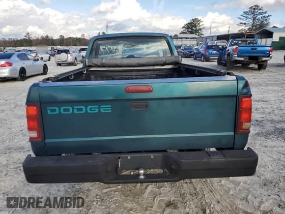 1995 Dodge Dakota with VIN 1B7FL26G5SW928193, listed as a Copart auction lot 84797384 with 165,698 mi miles and Salvage title. Bid and sale history available at DreamBid. Image 6.