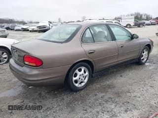 ✅ 1999 Oldsmobile Intrigue GLS • VIN: 1G3WX52H6XF321750 • Lot: 41505500. Listed on IAAI with 180,036 mi. Free auction sales archive from the USA and detailed vehicle history report at DreamBid. Image 4.