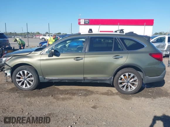 ✅ 2018 Subaru Outback Touring • VIN: 4S4BSETC2J3298701 • Lot: 43314263. Listed on IAAI with 125,125 mi. Free auction sales archive from the USA and detailed vehicle history report at DreamBid. Image 15.