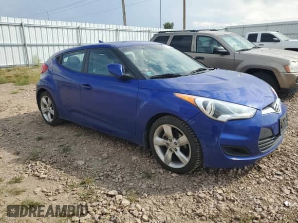 2012 Hyundai Veloster w/Red Int с VIN KMHTC6AD8CU042093, выставлен на аукционе Copart как лот 71263784 с пробегом 94 528 миль миль и Чистый • Clean title. История ставок и продаж доступна на DreamBid. Изображение 4.