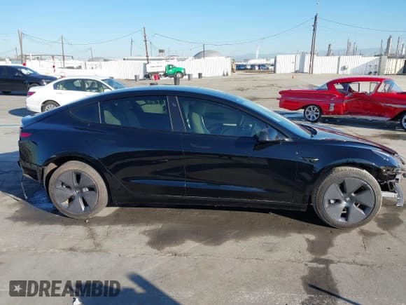 ✅ 2023 Tesla Model 3 • VIN: 5YJ3E1EA8PF514308 • Лот: 43575265. Опубликован ранее на IAAI с пробегом 35 114 миль. Бесплатный доступ к архиву аукционных продаж из США и подробный отчёт об истории автомобиля на DreamBid. Изображение 14.