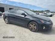 ✅ 2020 Hyundai Elantra SEL • VIN: 5NPD84LF7LH598662 • Lot: 82491245. Listed on Copart with 91,922 mi. Free auction sales archive from the USA and detailed vehicle history report at DreamBid. Image 4.