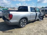 ✅ 2020 Honda Ridgeline RTL • VIN: 5FPYK3F5XLB025857 • Lot: 42307343. Listed on IAAI with 97,262 mi. Free auction sales archive from the USA and detailed vehicle history report at DreamBid. Image 4.