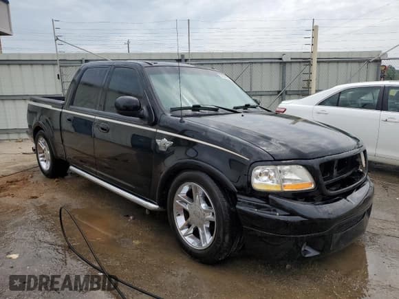 ✅ 2003 Ford F-150 Harley-Davidson • VIN: 1FTRW07333KD41438 • Lot: 54342755. Listed on Copart with 216,391 mi. Free auction sales archive from the USA and detailed vehicle history report at DreamBid. Image 4.