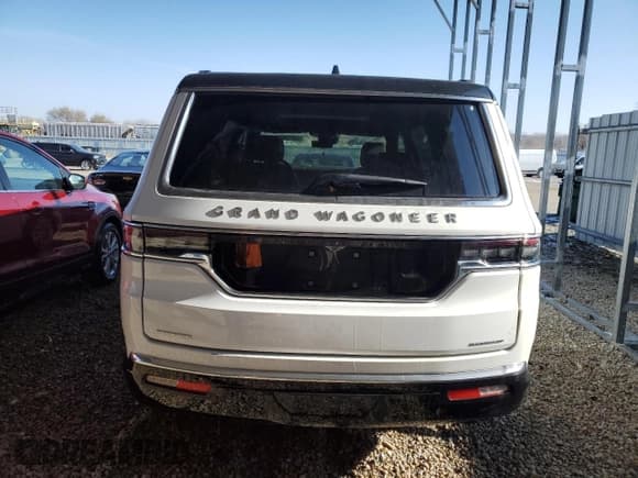 ✅ 2023 Jeep Grand Wagoneer Series II • VIN: 1C4SJVFP5PS509149 • Лот: 82158774. Опубликован ранее на Copart с пробегом 23 382 миль. Бесплатный доступ к архиву аукционных продаж из США и подробный отчёт об истории автомобиля на DreamBid. Изображение 6.