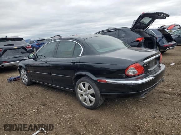 ✅ 2004 Jaguar X-Type • VIN: SAJEA51C24WE08340 • Lot: 82683605. Listed on Copart with 202,758 mi. Free auction sales archive from the USA and detailed vehicle history report at DreamBid. Image 2.