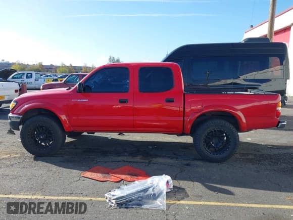 ✅ 2003 Toyota Tacoma PreRunner • VIN: 5TEGN92N53Z258595 • Лот: 43567002. Опубликован ранее на IAAI с пробегом 179 803 миль. Бесплатный доступ к архиву аукционных продаж из США и подробный отчёт об истории автомобиля на DreamBid. Изображение 13.