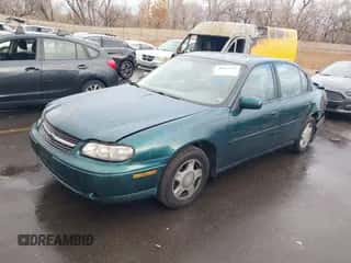 2000 Chevrolet Malibu LS z VIN 1G1NE52J4Y6135123, wystawiony jako IAAI lot #41162955 z przebiegiem 164 327 mil mil oraz . Historia ofert i sprzedaży dostępna na DreamBid. Obrazek 2.