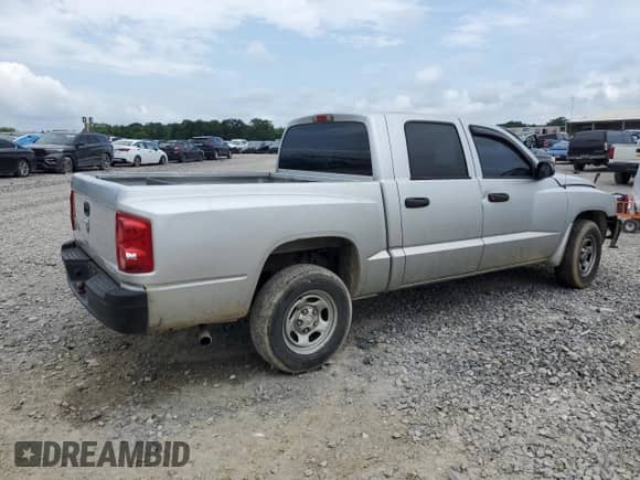 2007 Dodge Dakota ST с VIN 1D7HW28K27S219016, выставлен на аукционе Copart как лот 60975835 с пробегом Не указан миль и Списание • Salvage title. История ставок и продаж доступна на DreamBid. Изображение 3.