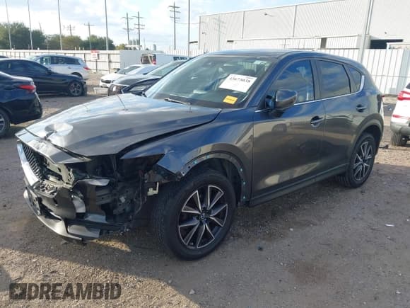 ✅ 2018 Mazda CX-5 Touring • VIN: JM3KFACM8J0375736 • Lot: 43673038. Wystawiony na IAAI z przebiegiem 111 478 mil. Bezpłatny archiwum sprzedaży aukcyjnych z USA i szczegółowy raport historii pojazdu na DreamBid. Zdjęcie 18.