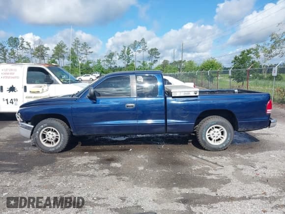 ✅ 2000 Dodge Dakota • VIN: 1B7GL22X3YS523895 • Lot: 42247540. Wystawiony na IAAI z przebiegiem 159 138 mil. Bezpłatny archiwum sprzedaży aukcyjnych z USA i szczegółowy raport historii pojazdu na DreamBid. Zdjęcie 14.