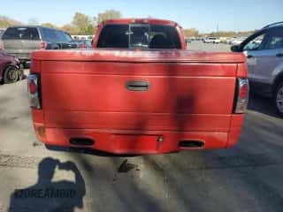 1999 Dodge Dakota Sport z VIN 1B7GL22Z4XS276158, wystawiony jako Copart lot #76972714 z przebiegiem 159 628 mil mil oraz Szkoda całkowita • Salvage title. Historia ofert i sprzedaży dostępna na DreamBid. Obrazek 6.