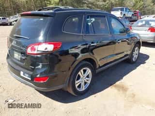 2012 Hyundai Santa Fe Limited z VIN 5XYZK3AB8CG131257, wystawiony jako IAAI lot #43444042 z przebiegiem 90 517 mil mil oraz . Historia ofert i sprzedaży dostępna na DreamBid. Obrazek 4.