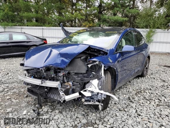 ✅ 2022 Tesla Model X • VIN: 7SAXCAE53NF359838 • Lot: 62022042. Listed on Copart with Not provided. Free auction sales archive from the USA and detailed vehicle history report at DreamBid. Image 2.