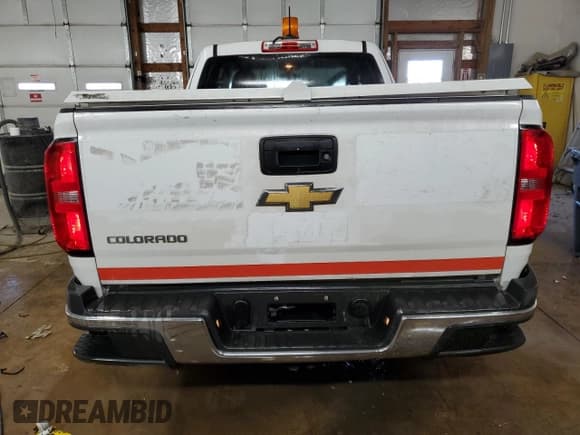 ✅ 2018 Chevrolet Colorado 2WD Work Truck • VIN: 1GCHSBEA8J1193763 • Лот: 76504274. Опубликован ранее на Copart с пробегом 99 091 миль. Бесплатный доступ к архиву аукционных продаж из США и подробный отчёт об истории автомобиля на DreamBid. Изображение 6.