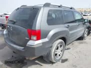 ✅ 2005 Mitsubishi Endeavor XLS • VIN: 4A4MM31SX5E001151 • Lot: 41745767. Listed on IAAI with 165,659 mi. Free auction sales archive from the USA and detailed vehicle history report at DreamBid. Image 4.