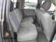 2006 Dodge Dakota SLT z VIN 1D7HW48N56S678965, wystawiony jako Copart lot #70227054 z przebiegiem 159 890 mil mil oraz Szkoda całkowita • Salvage title. Historia ofert i sprzedaży dostępna na DreamBid. Obrazek 11.