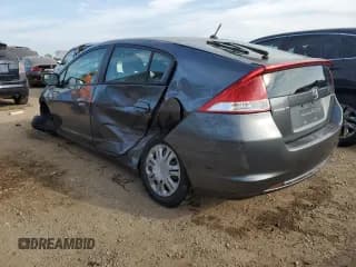 ✅ 2010 Honda Insight LX • VIN: JHMZE2H52AS019478 • Лот: 67657704. Опубликован ранее на Copart с пробегом 186 688 миль. Бесплатный доступ к архиву аукционных продаж из США и подробный отчёт об истории автомобиля на DreamBid. Изображение 2.