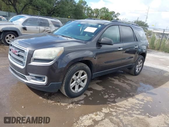 ✅ 2014 GMC Acadia SLE • VIN: 1GKKRNED0EJ110236 • Lot: 43406237. Listed on IAAI with 207,815 mi. Free auction sales archive from the USA and detailed vehicle history report at DreamBid. Image 2.