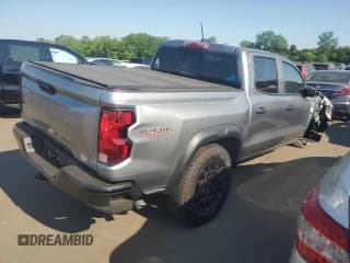 ✅ 2024 Chevrolet Colorado 4WD Trail Boss • VIN: 1GCPTEEK2R1109726 • Лот: 55702654. Опубликован ранее на Copart с пробегом 273 миль. Бесплатный доступ к архиву аукционных продаж из США и подробный отчёт об истории автомобиля на DreamBid. Изображение 3.