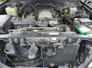 ✅ 1998 Lexus LX 470 • VIN: JT6HT00W5W0021005 • Lot: 92579505. Wystawiony na Copart z przebiegiem 244 254 mil. Bezpłatny archiwum sprzedaży aukcyjnych z USA i szczegółowy raport historii pojazdu na DreamBid. Zdjęcie 12.