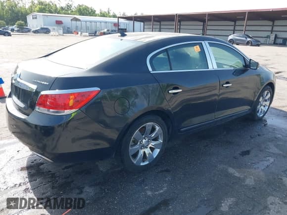 ✅ 2012 Buick LaCrosse Premium 3 • VIN: 1G4GH5E35CF340524 • Lot: 42434141. Listed on IAAI with 174,600 mi. Free auction sales archive from the USA and detailed vehicle history report at DreamBid. Image 4.