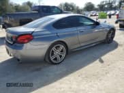 ✅ 2013 BMW 6 Series 650i • VIN: WBAYM9C57DDW20035 • Лот: 47051175. Опубликован ранее на Copart с пробегом 96 315 миль. Бесплатный доступ к архиву аукционных продаж из США и подробный отчёт об истории автомобиля на DreamBid. Изображение 3.