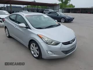 ✅ 2013 Hyundai Elantra GLS • VIN: 5NPDH4AE7DH268063 • Lot: 42269526. Listed on IAAI with 123,067 mi. Free auction sales archive from the USA and detailed vehicle history report at DreamBid. Image 1.