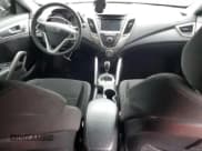 ✅ 2014 Hyundai Veloster • VIN: KMHTC6ADXEU218175 • Lot: 80188704. Wystawiony na Copart z przebiegiem 143 459 mil. Bezpłatny archiwum sprzedaży aukcyjnych z USA i szczegółowy raport historii pojazdu na DreamBid. Zdjęcie 8.