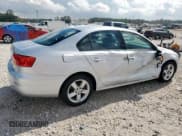 ✅ 2013 Volkswagen Jetta • VIN: 3VW2K7AJXDM296437 • Lot: 93738215. Listed on Copart with 124,866 mi. Free auction sales archive from the USA and detailed vehicle history report at DreamBid. Image 3.