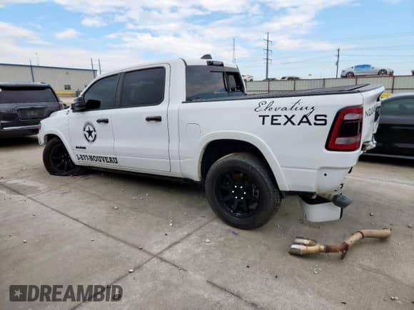 2024 Ram 1500 Limited with VIN 1C6SRFHT5RN121968, listed as a Copart auction lot 68899715 with 33,468 mi miles and Salvage title. Bid and sale history available at DreamBid. Image 2.